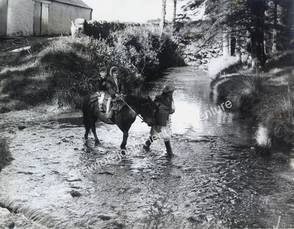 Children walking to school near Crawfordjohn