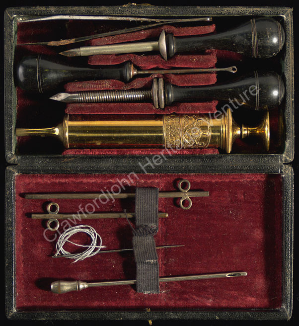Historic veterinary tools in a case